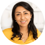 Maria is a middle-aged hispanic woman with long black hair, wearing a yellow top, and is smiling.